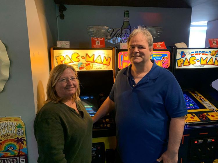 The Brenemans at Player1Up Arcade in Rock Hill, SC. Pac-Man is celebrating 40 years, and the Brenemans are celebrating their 40th anniversary this year as well [Image by Frank Breneman]